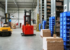 A warehouse operating safely and moving goods and inventory around